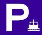 blue sign with a large white capital letter P and a smaller ferry icon