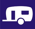 blue sign with a white icon of a caravan