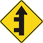 yellow sign with straight black arrow with 2 branches off the left of the tail