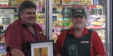 SPAR Malanda owner Michael English with a long-time staff member, Stephen Proudfoot.