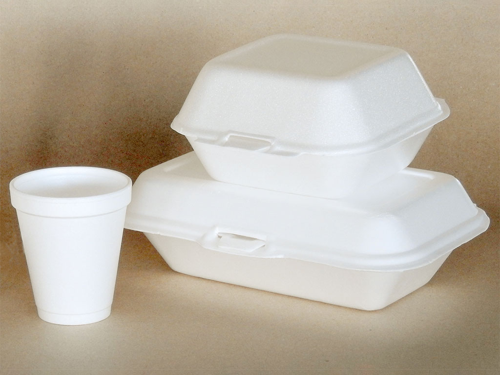 Single-use expanded polystyrene takeaway food containers and cups.