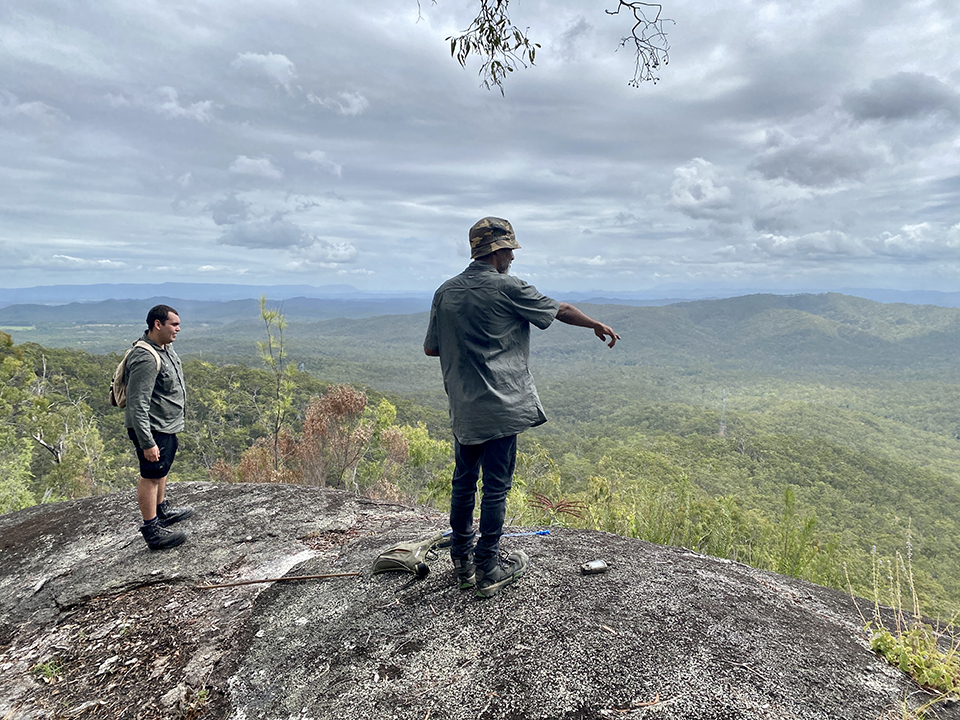 Buluwai Rangers monitoring an unmarked trail being used by walkers