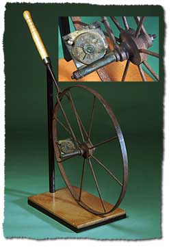 A surveyor\'s wheel used to measure the distances on surveys