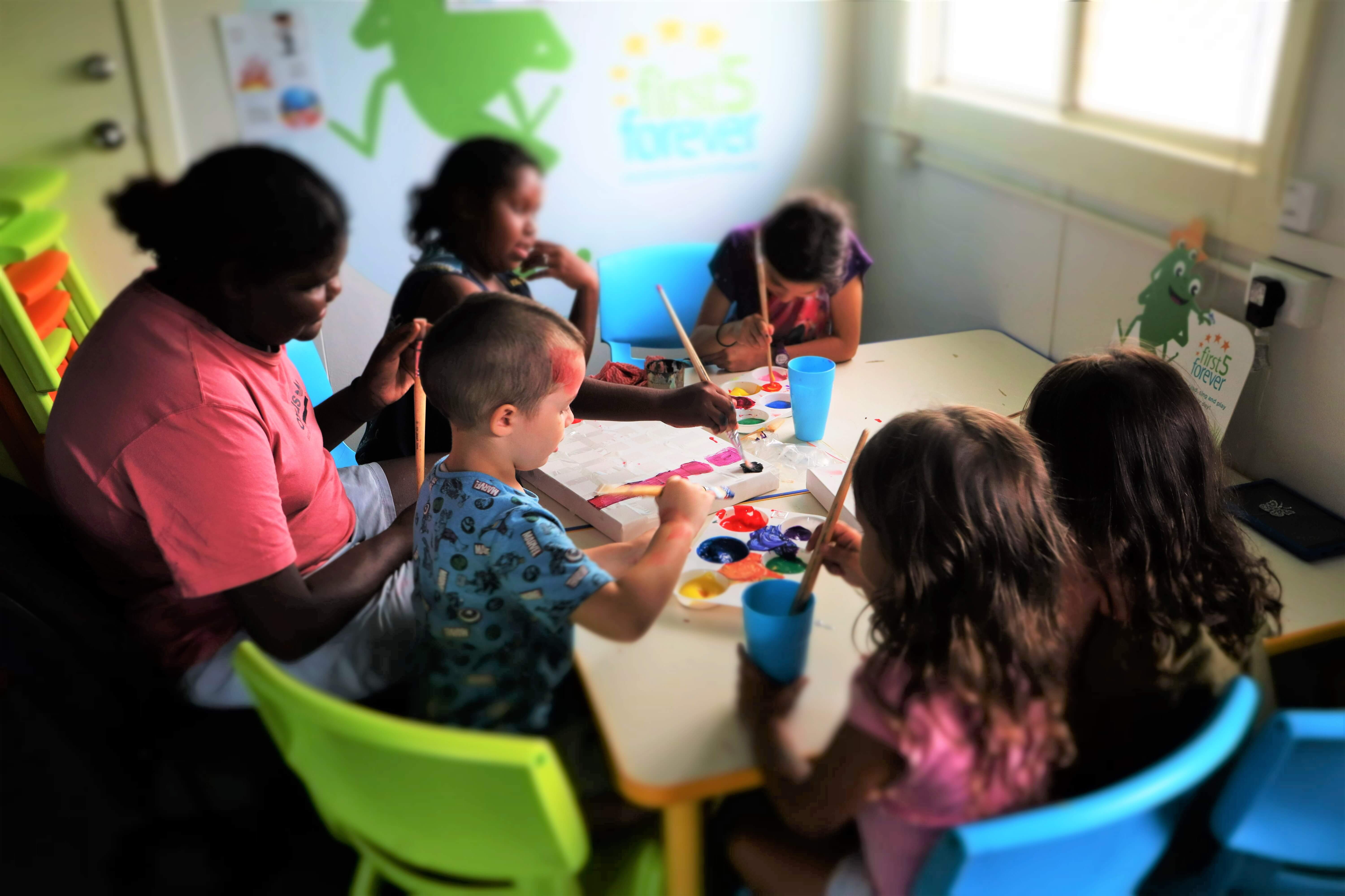 Children creating artwork for the app at the Wujal Wujal Indigenous Knowledge Centre