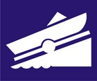 blue sign with white icon of a boat and trailer on a ramp