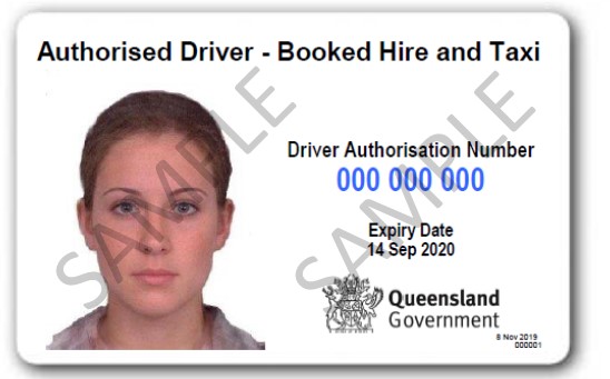 Current authorised driver card example. Shows photograph, driver number, expiry date of taxi driver authorisation and the Queensland Government crest.