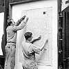 Preparing a map on the copy board for photographic reproduction by the Hunter Penrose camera