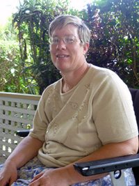 Jan Christison, who receives support from her husband and two daughters, at home on her front patio.