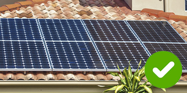 Good: A solar installation with clean solar panels firmly fixed to a roof, with no dirt or debris.