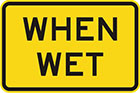 yellow sign with black text, when wet