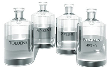 Illustration of bottles of common air toxics: toluene, benzene, xylene and formalin (40% v/v)