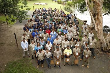 Photo of group of 120 Indigenous rangers gathered for annual conference.