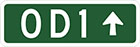 green sign with white text OD1 and an arrow