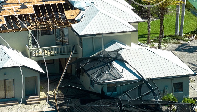 photo of damaged houses in Queensland after a cyclone