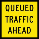 Sign saying queued traffic ahead
