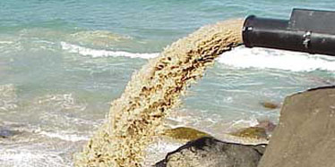 The Snapper Rocks East outlet discharging a sand-water mixture
