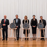 2017 Queensland Greats Awards recipients with plaques