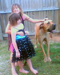 Belinda and Emma Jennings at their home in north Queensland, with Emma's Great Dane, Sebastian.