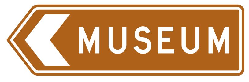 brown sign with white arrow to left and the word museum