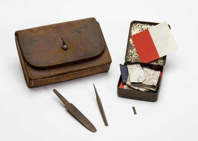 Leather field bag and its contents