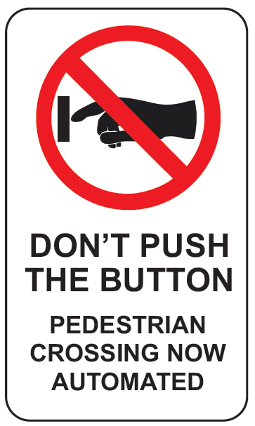 Sign don't push the button pedestrian crossing now automated