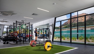 Gym floor with a range of weight training machines and equipment
