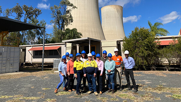 Central Queensland Forum members in front of the cooling towers at the Stanwell Power Station in Gracemere.