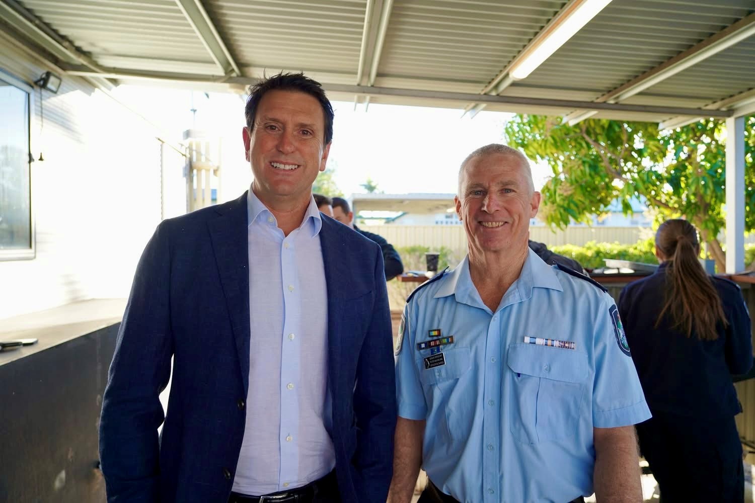 Police Minister with Senior Sergeant McFarlane of Emerald Police Station. Image courtesy of Queensland Police Service.
    