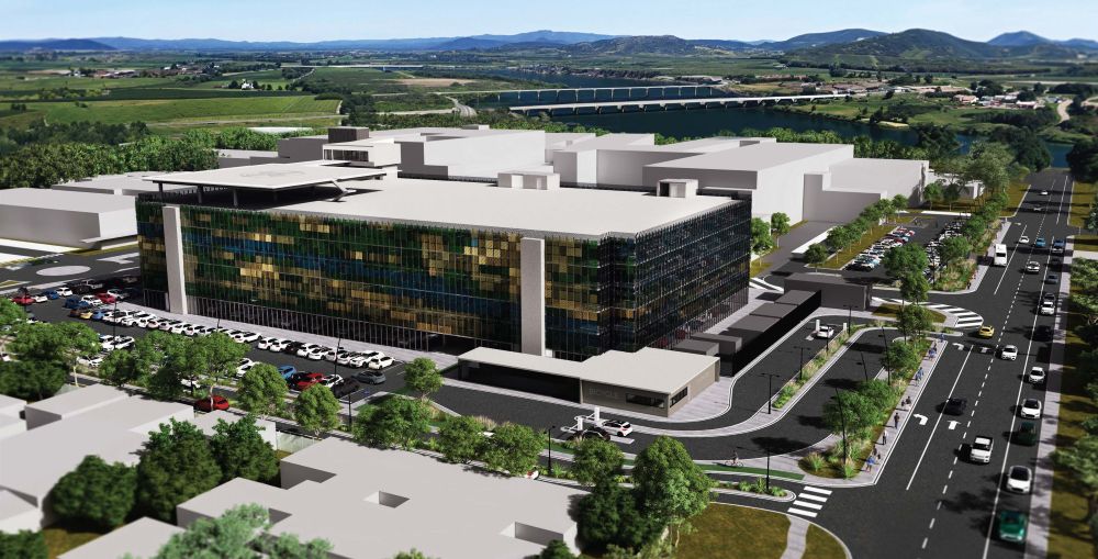 Artist’s impression of the new-look Mackay Base Hospital with the huge multi-storey car park. Image courtesy of Health Infrastructure Queensland