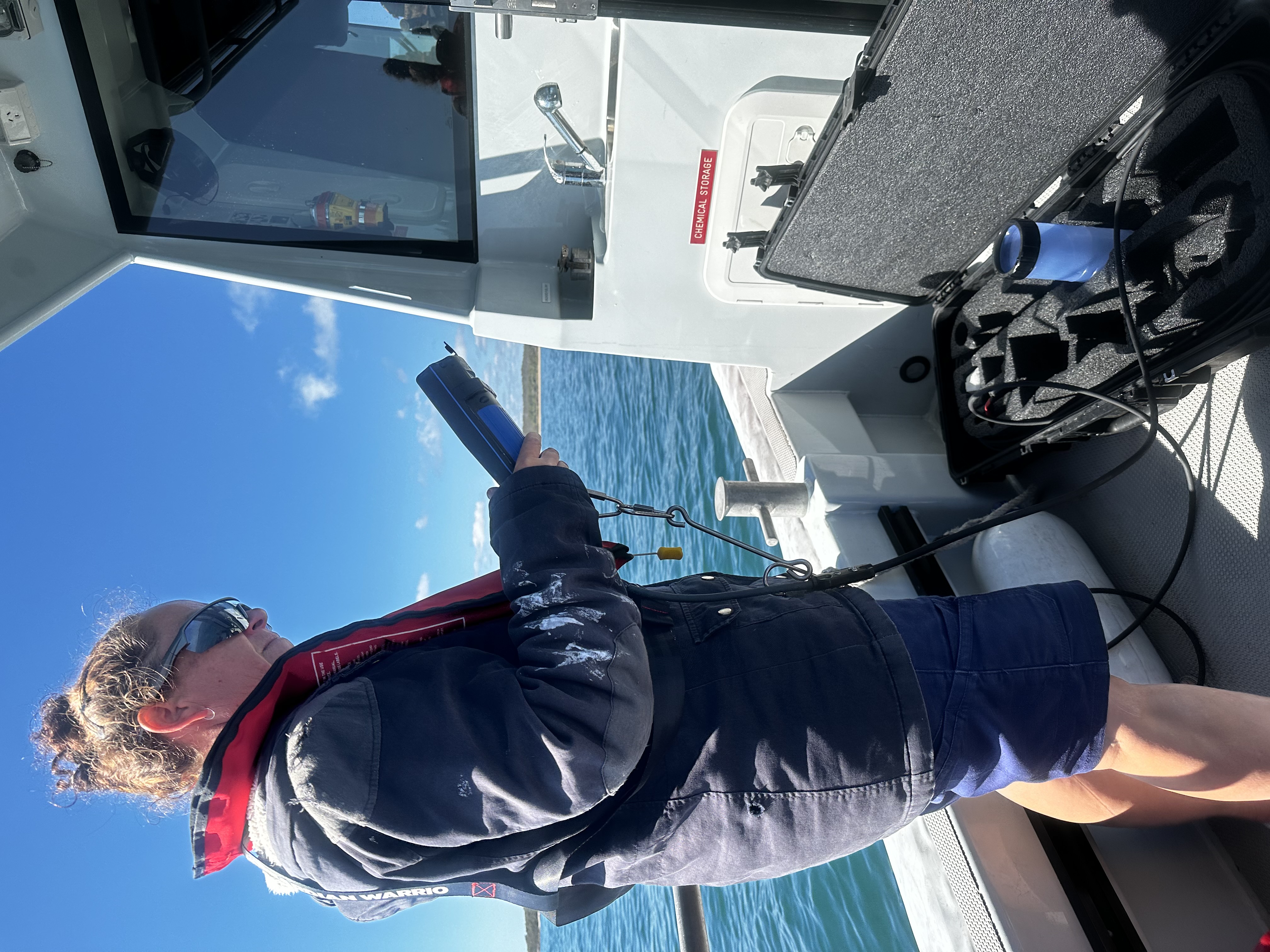 Gidarjil staff member undertaking inshore marine water quality monitoring in the southern Great Barrier Reef (Image courtesy of Gidarjil Development Corporation)