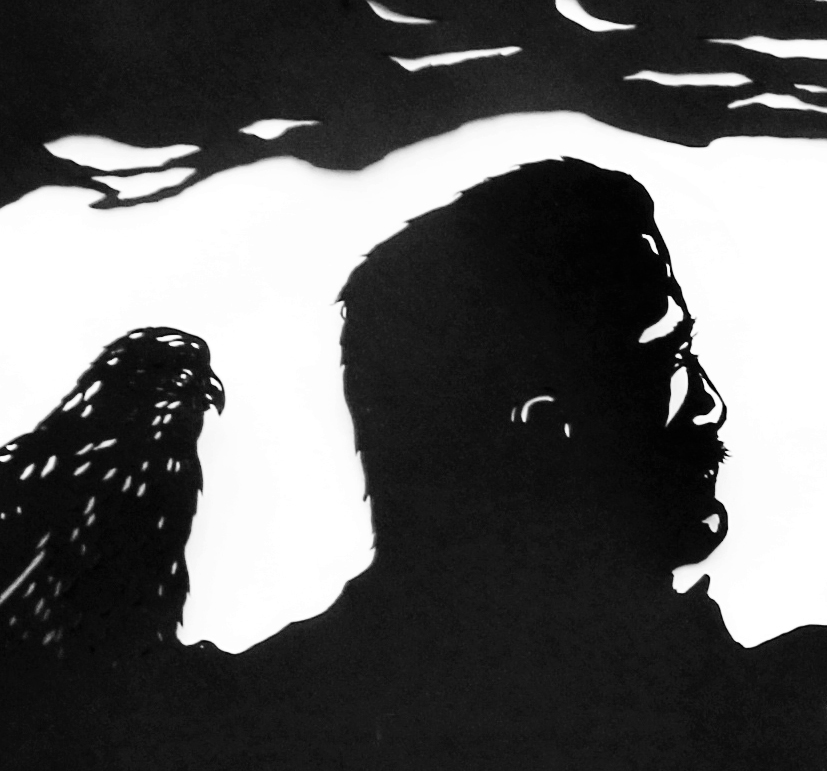 Part of man and bird artwork in exhibition